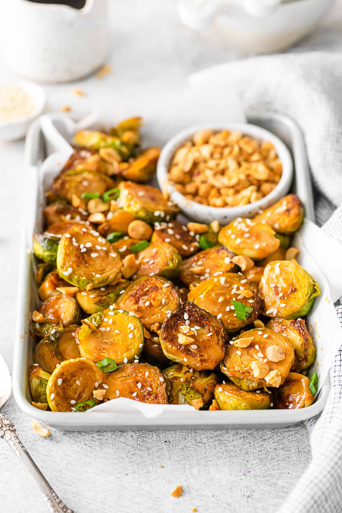 Kung Pao Brussels Sprouts topped with sesame seeds. 