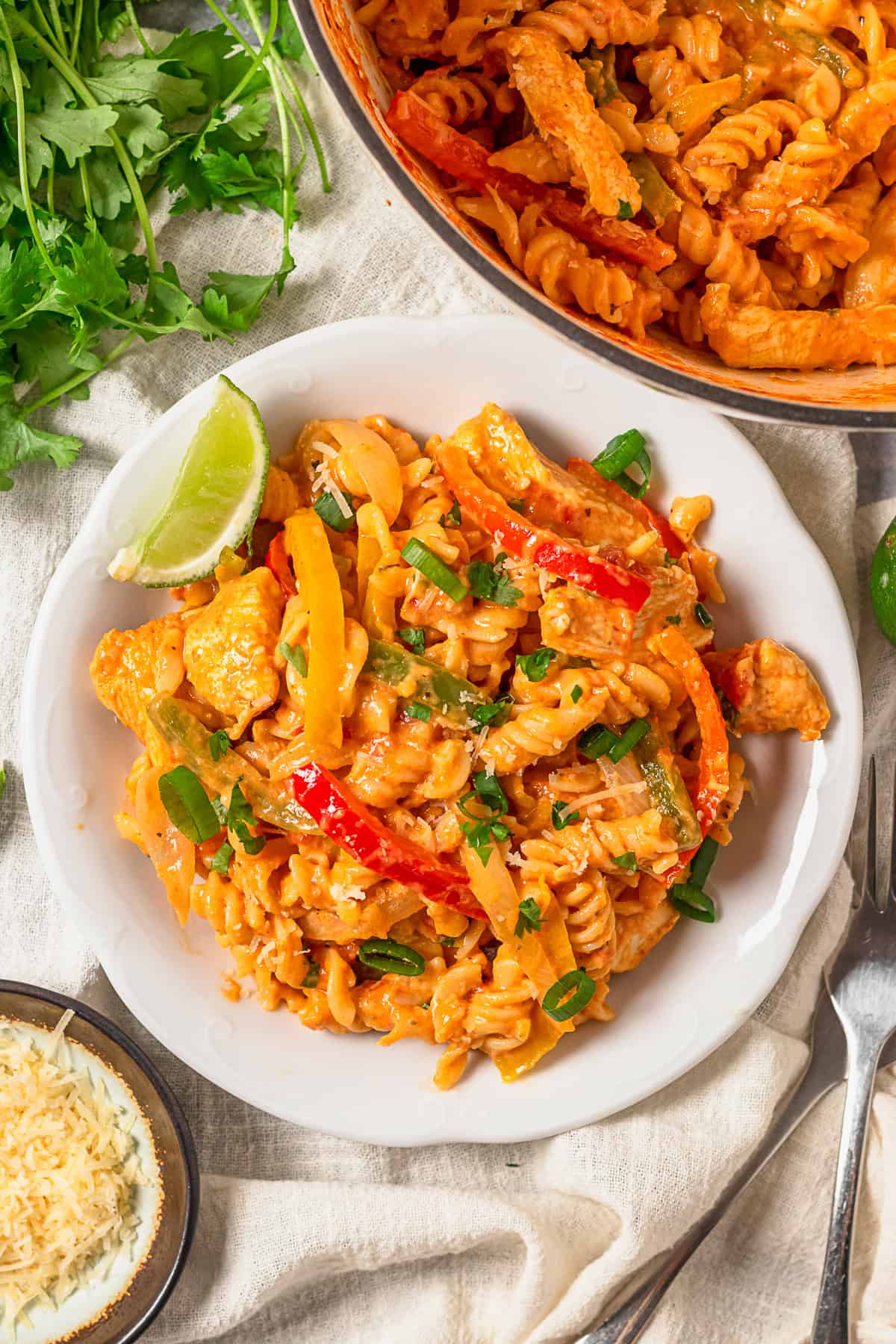 One Pot Chicken Fajita Pasta on a plate with cilantro. 