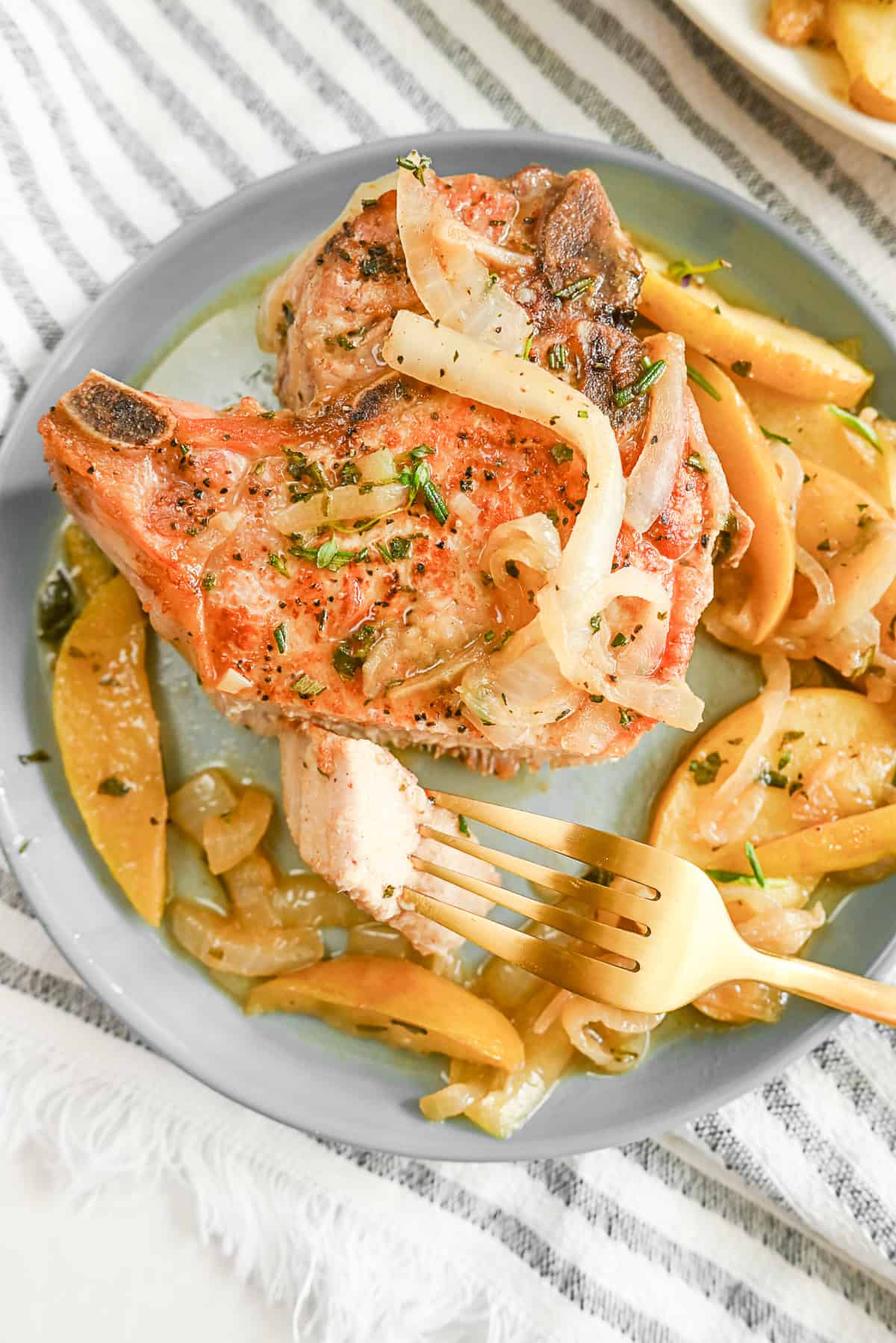 Pork Chops with Apples cut to show the inside of the pork chop. 