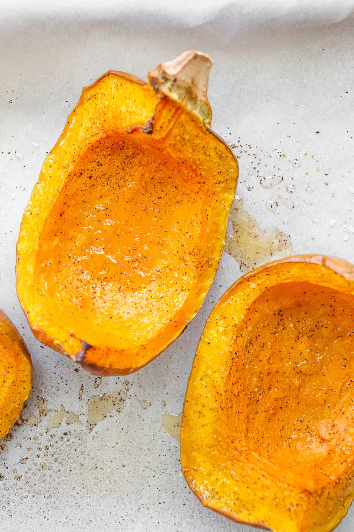 Roasted Koginut Squash on parchment. 