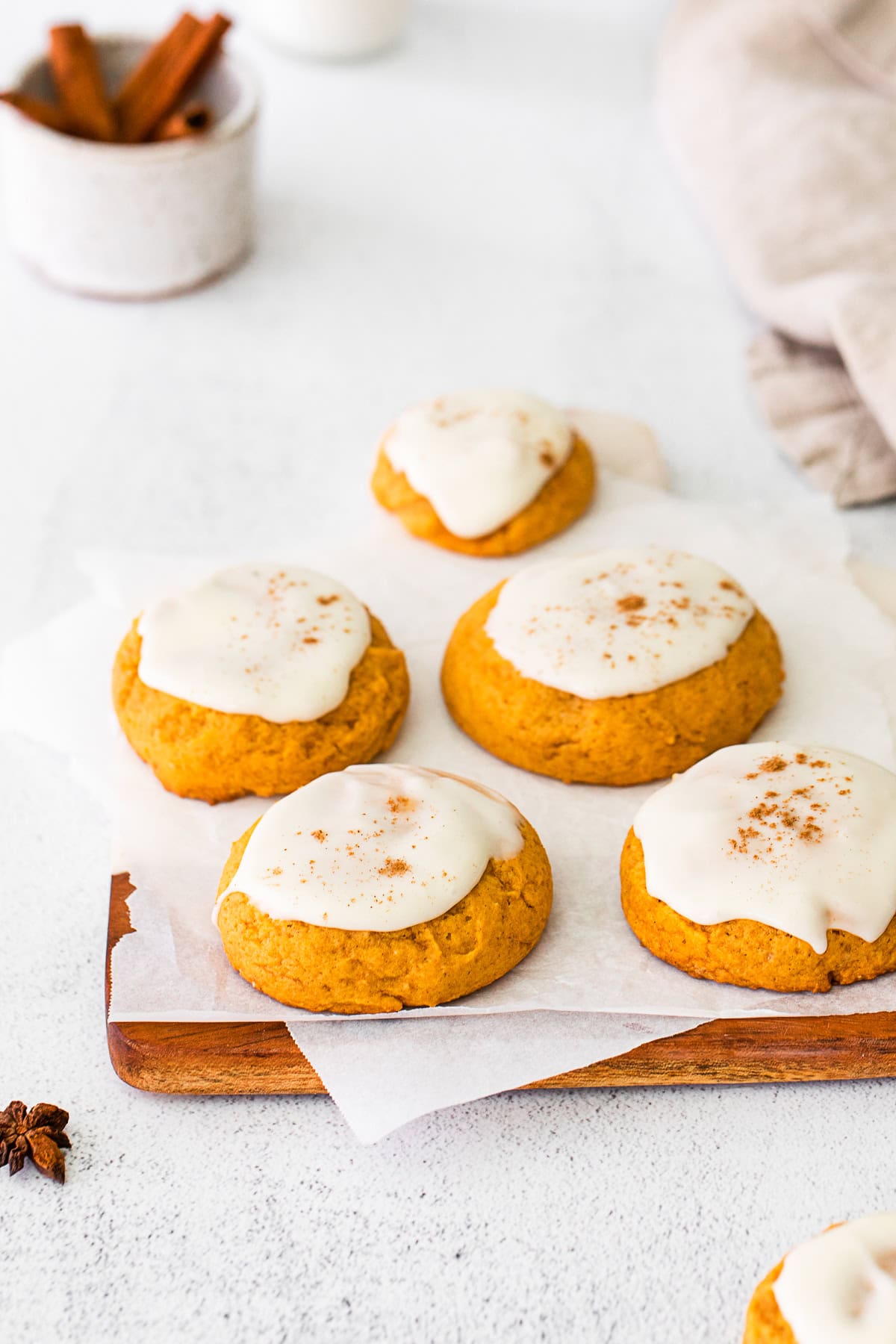Soft Pumpkin Cookies topped with cream cheese frosting. 