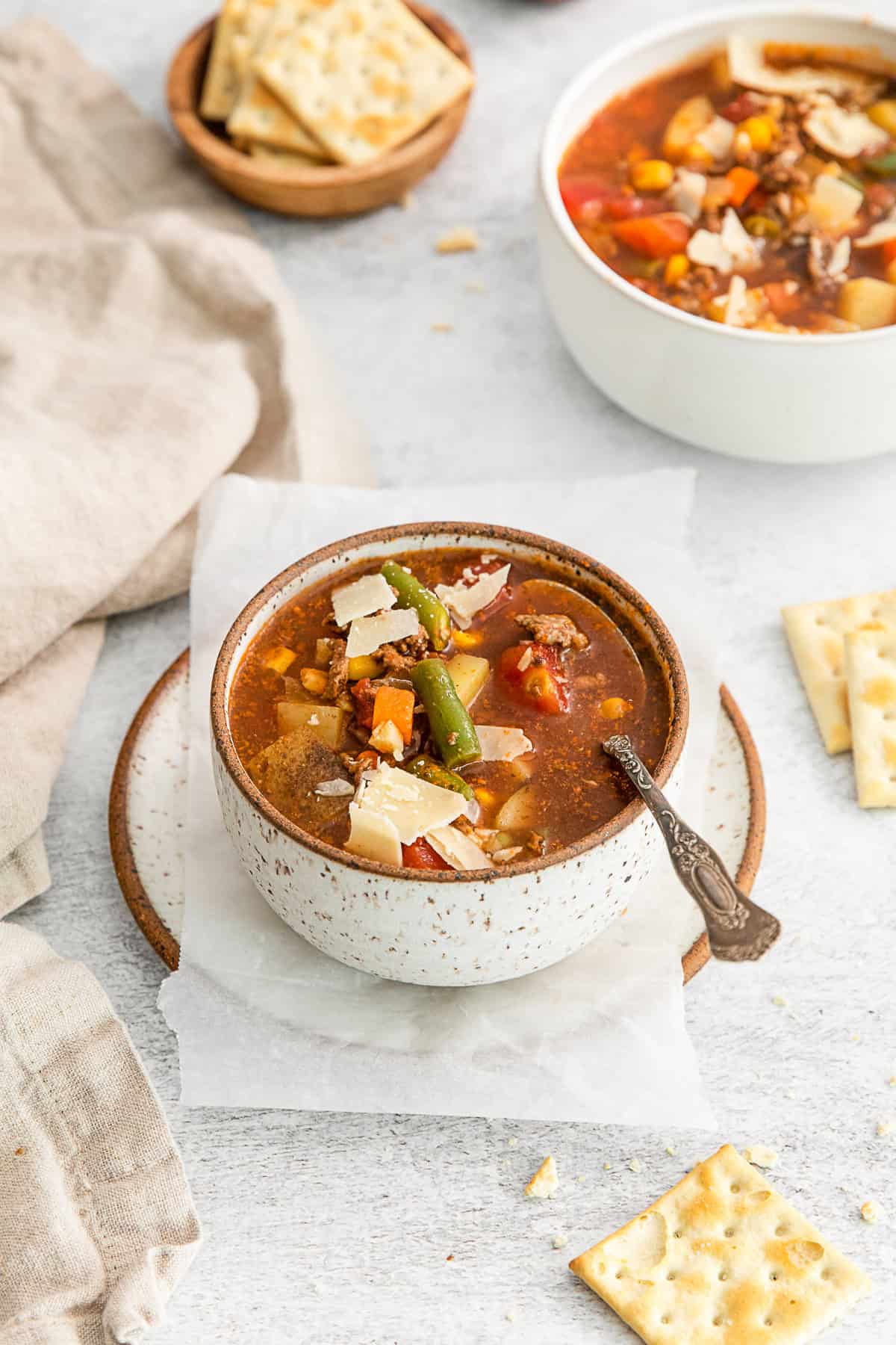 Vegetable Beef Soup served with crackers. 