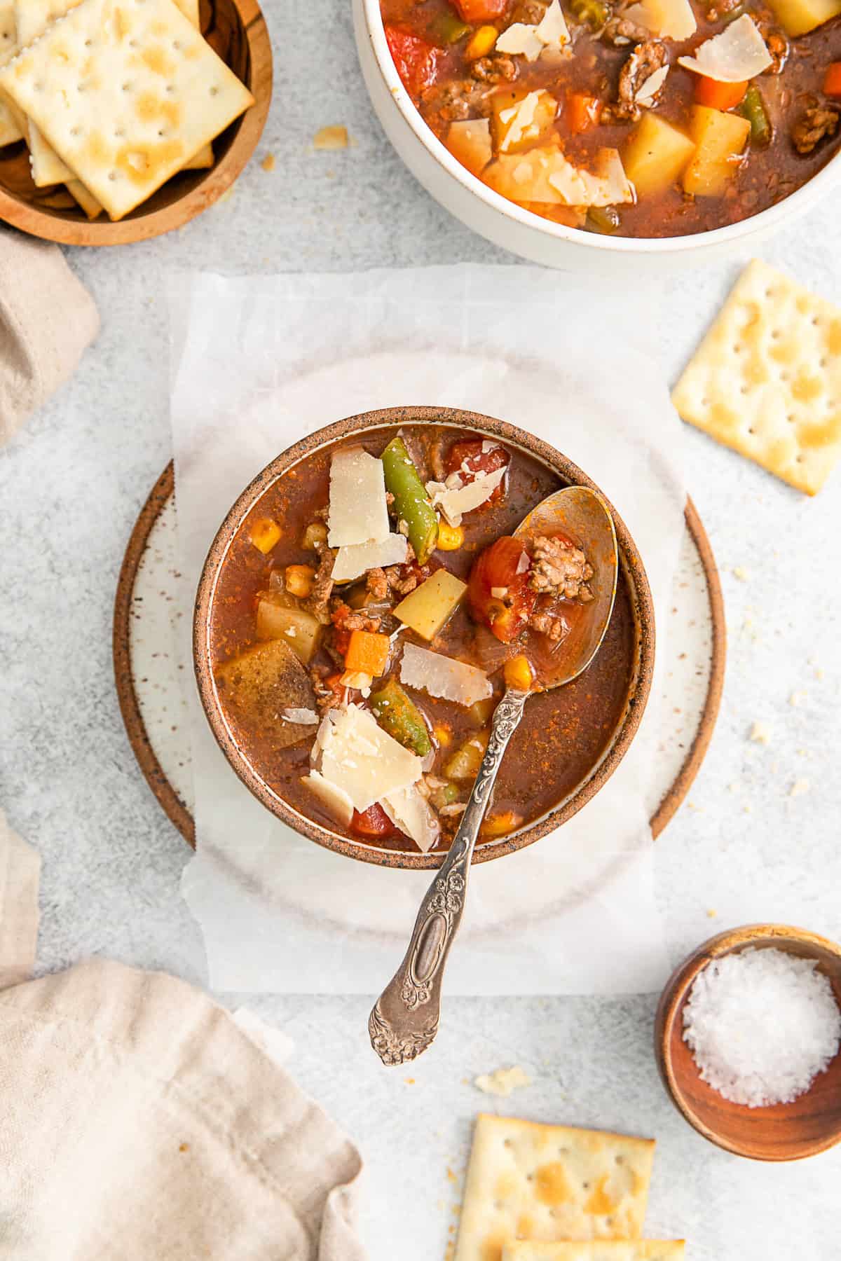 Vegetable Beef Soup in a bowl with a spoon. 