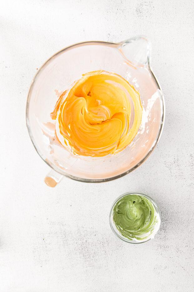 Colored meringue in 2 bowls.