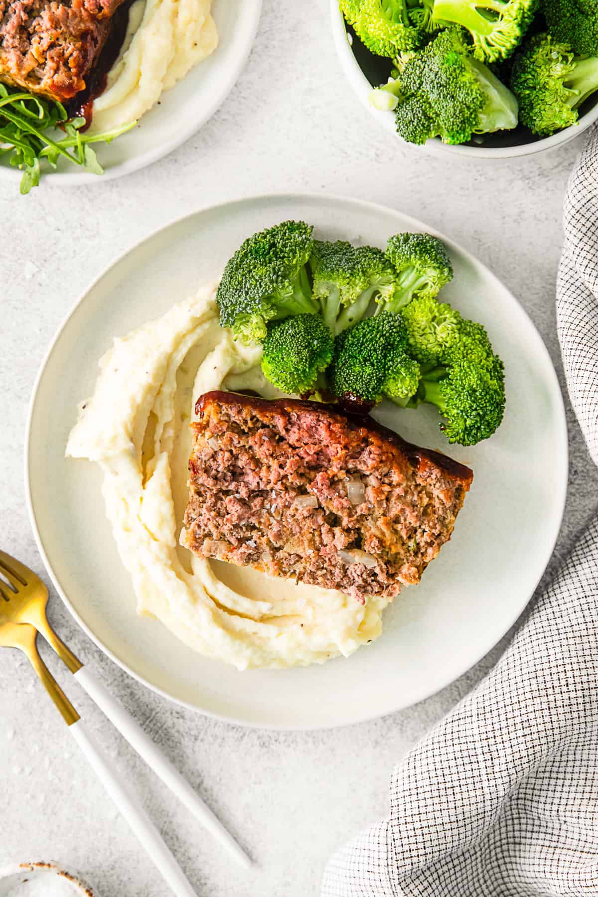 BBQ Glazed Meatloaf on a white plate. 