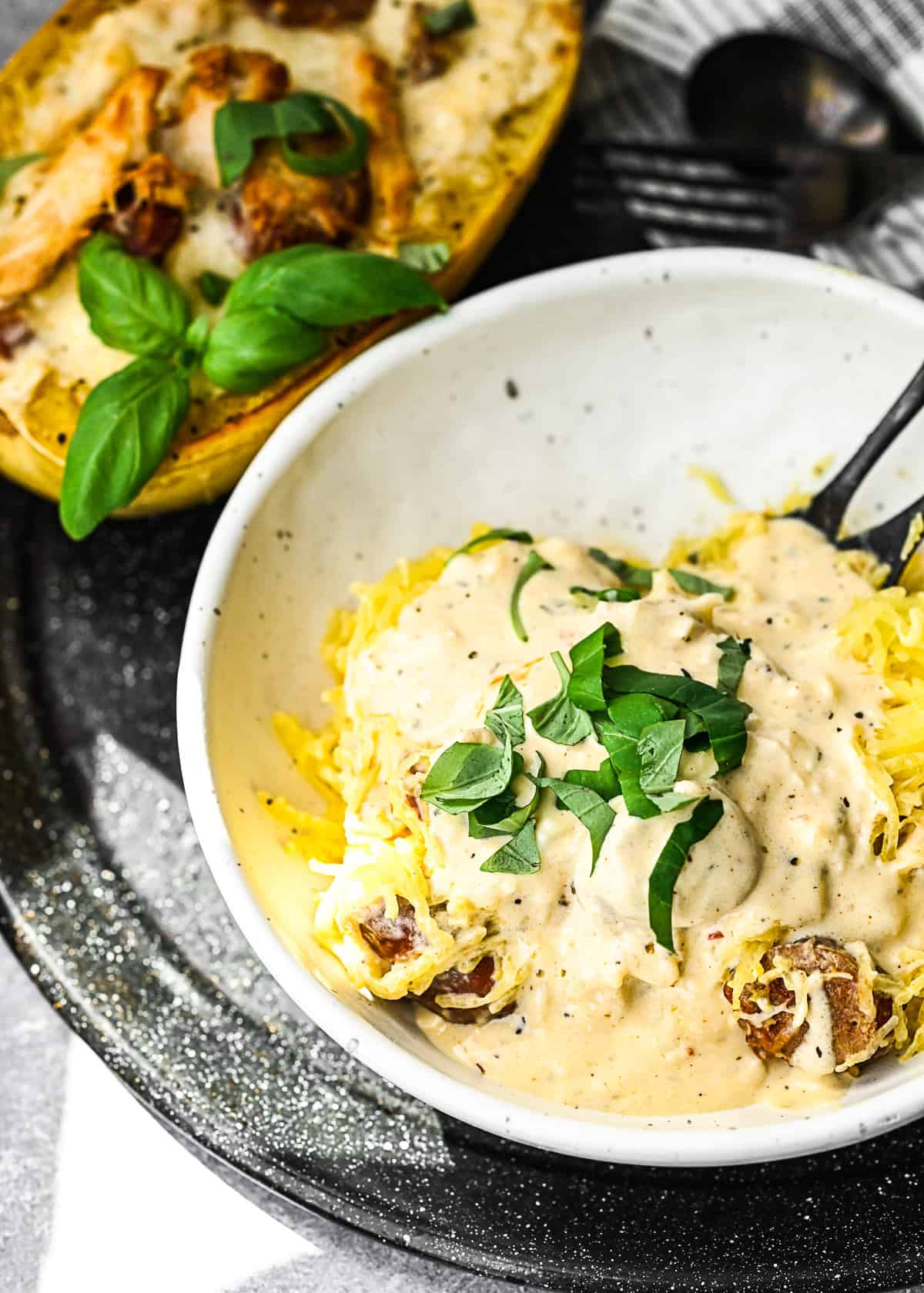 Cajun Chicken Alfredo Spaghetti Squash removed from the squash and put into a bowl.