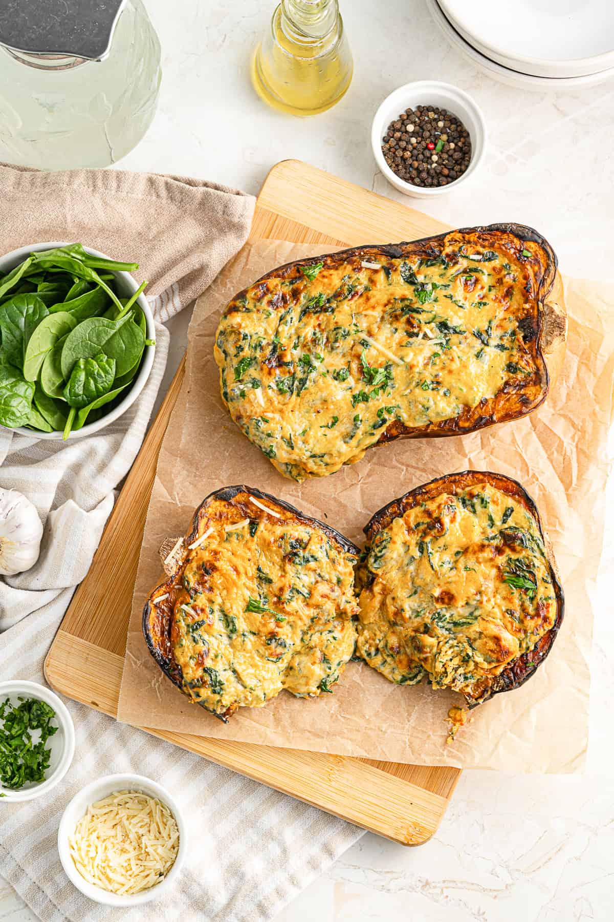 Cheese Stuffed Butternut Squash on parchment paper. 