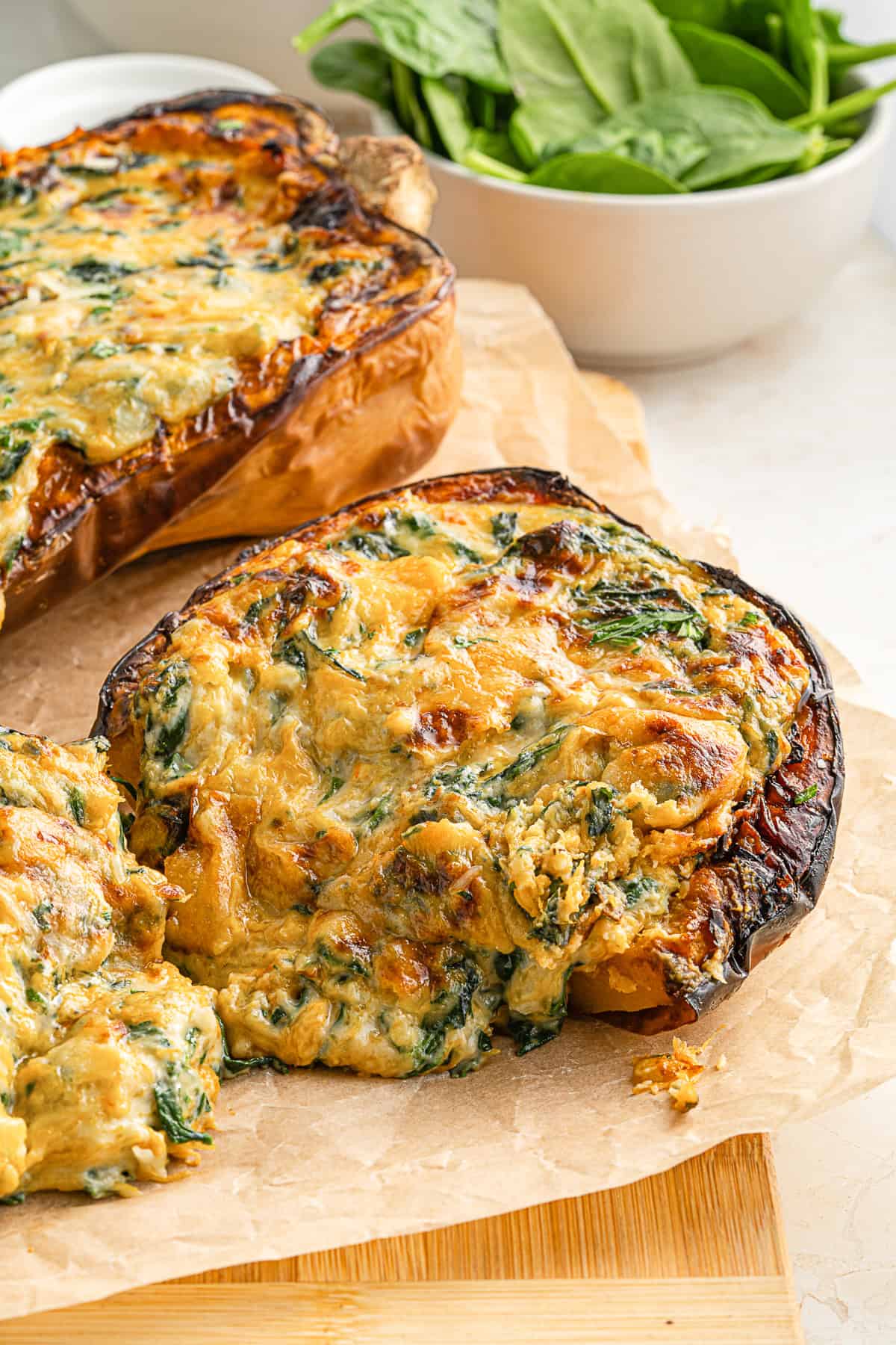 Cheese Stuffed Butternut Squash cut in half. 