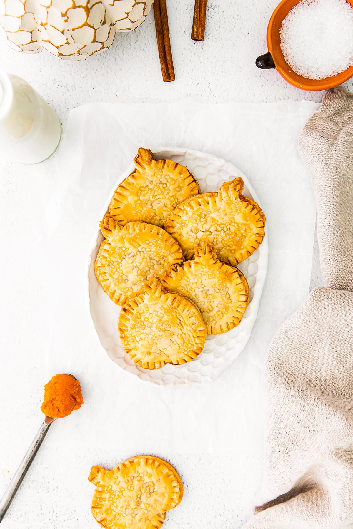 Pumpkin Hand Pies on a plate. 