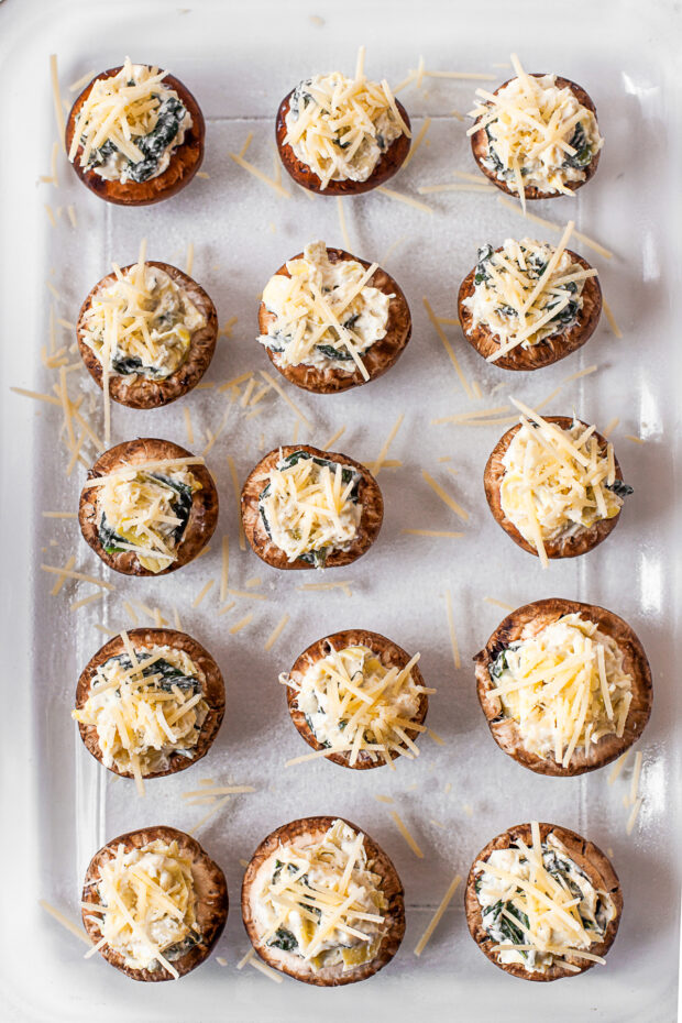 Uncooked stuffed mushrooms.