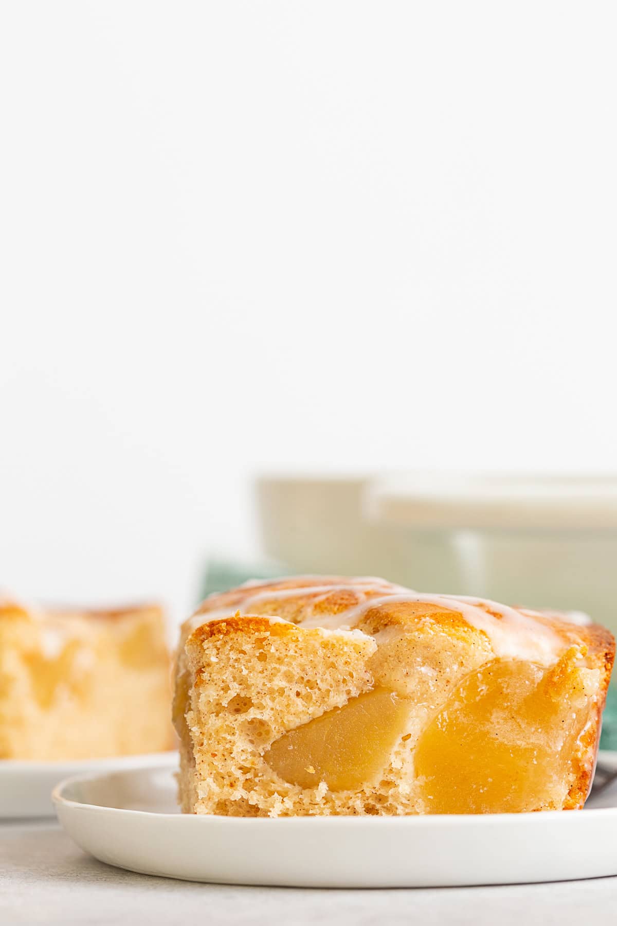 Up close picture of a slice of Apple Pie Filling Coffee Cake.