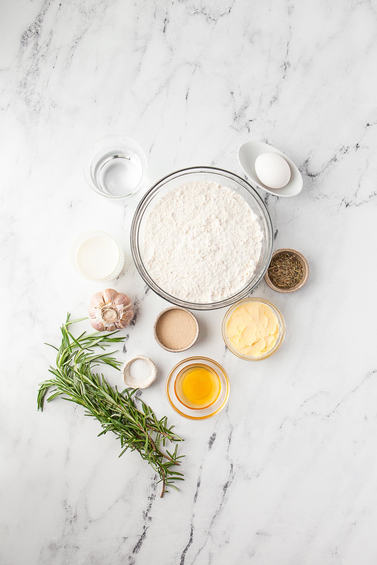 Garlic Herb Dinner Rolls ingredients on a table. 