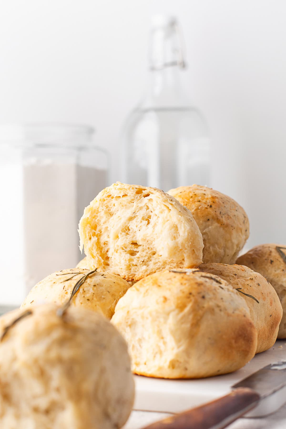 A cut in half Garlic Herb Dinner Rolls. 