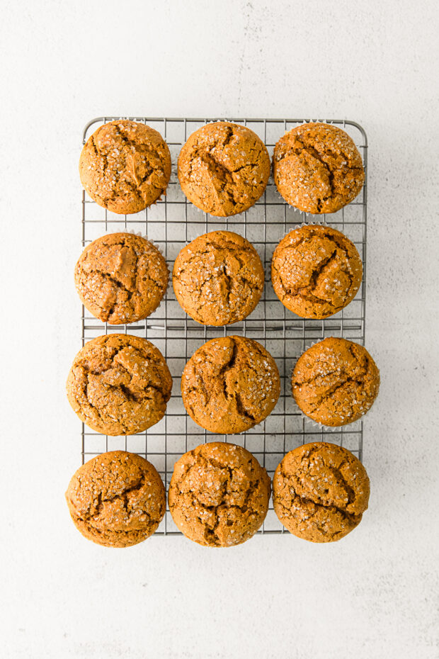 Cooked Gingerbread Muffins on a cooling rack. 