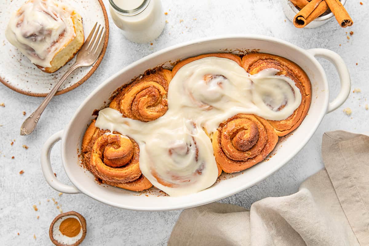 Homemade Cinnamon Rolls in a white baking dish.