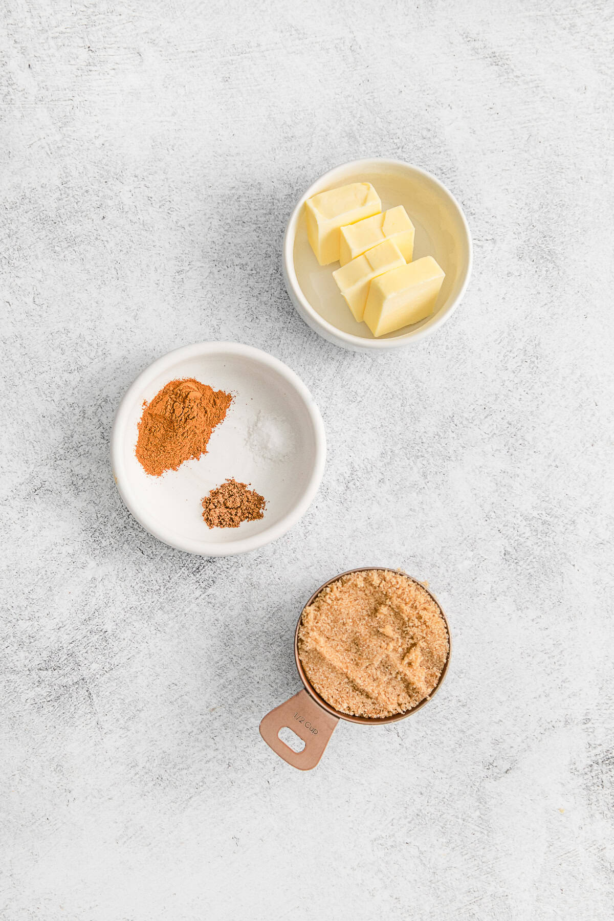 Brown sugar and cinnamon filling ingredients on a table.