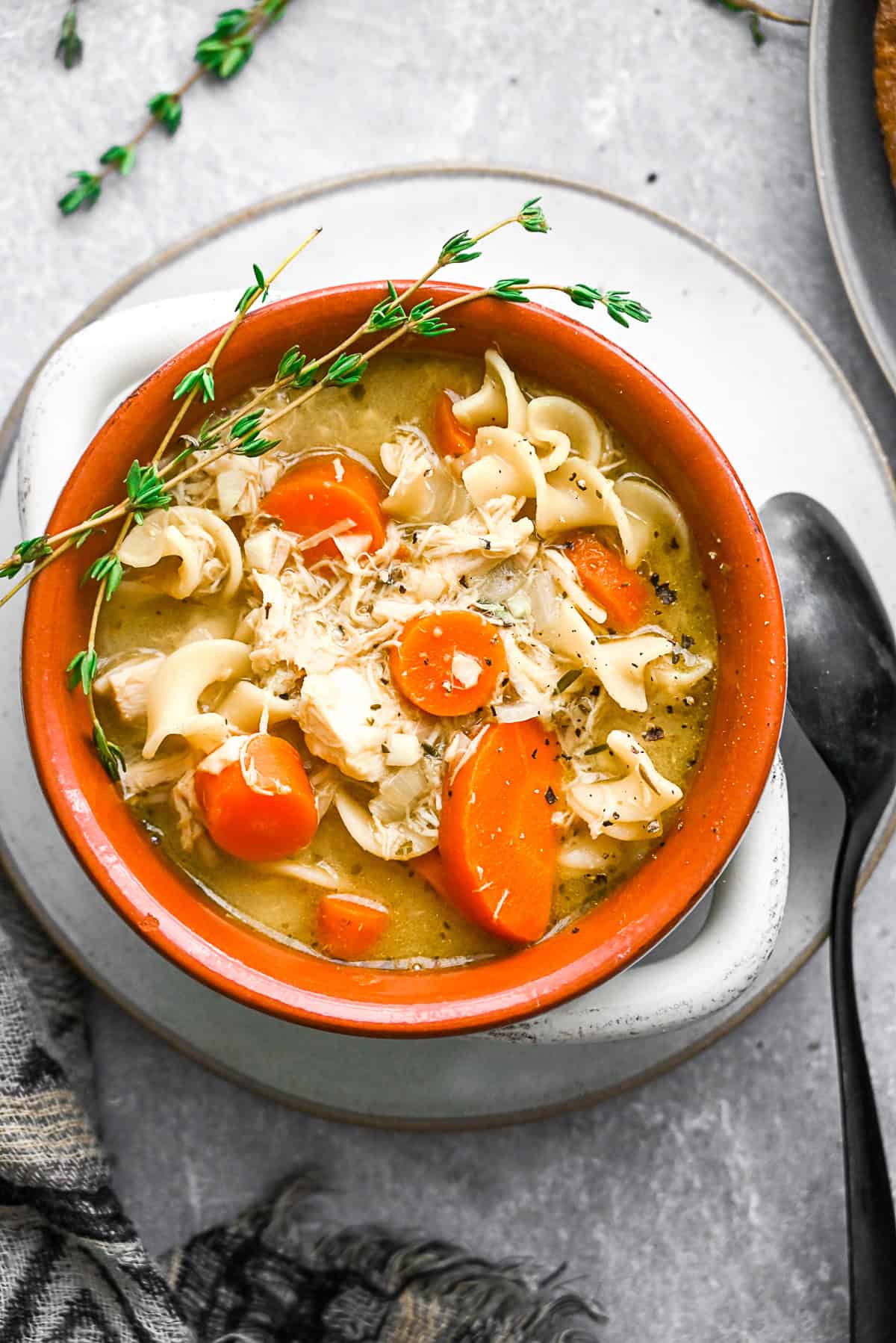 Leftover Turkey Noodle Soup topped with pepper. 