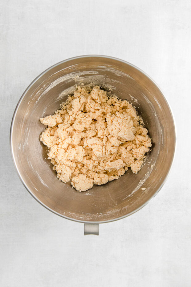 Shortbread dough in a mixer bowl. 