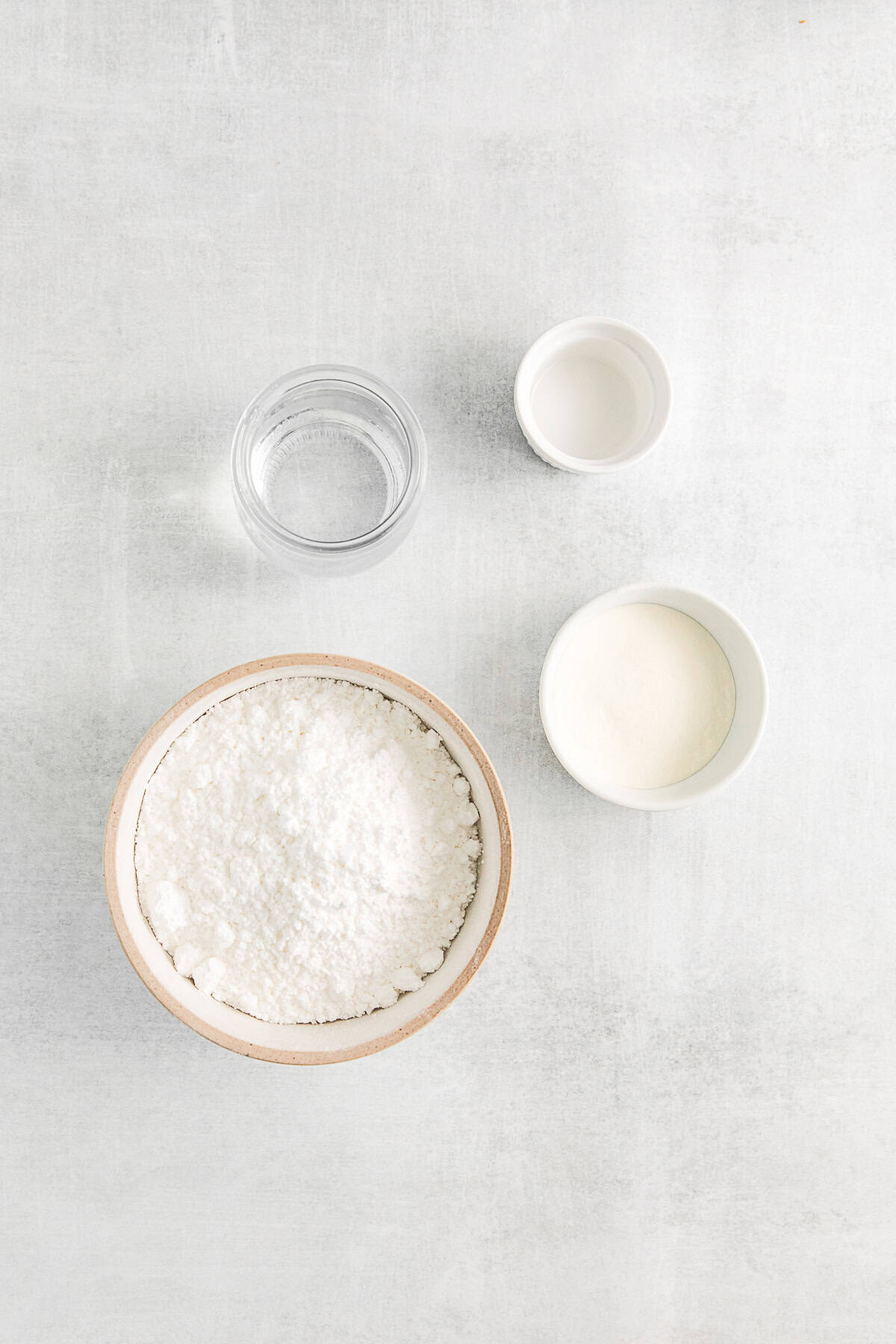 Royal icing ingredients on a table. 