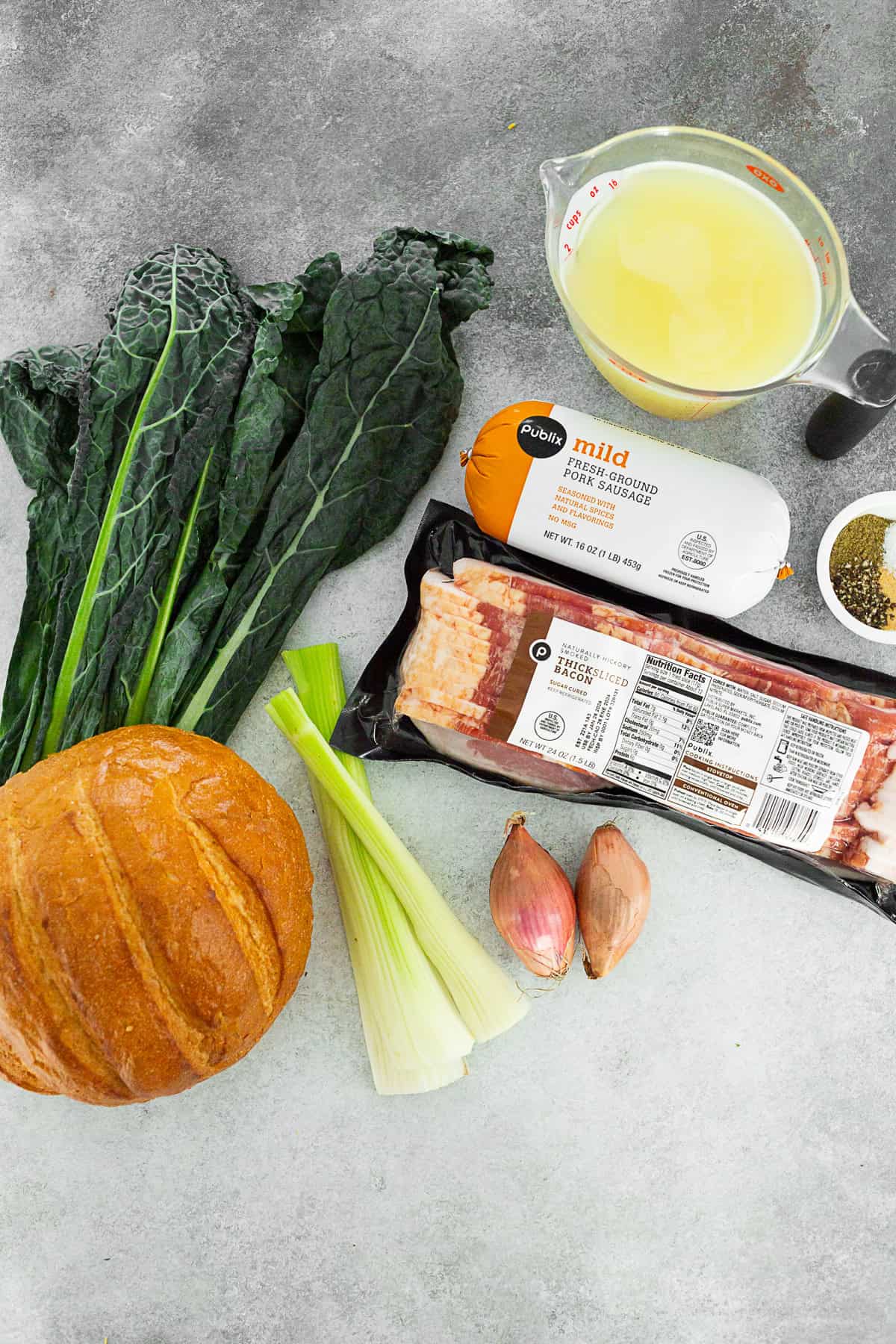 Ingredients to make sausage stuffing on a table. 