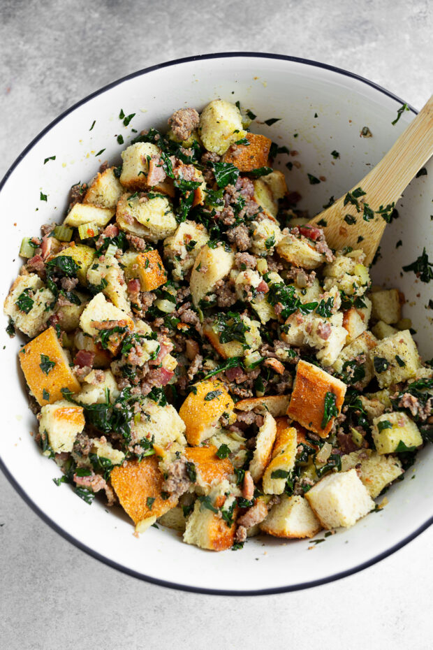 Sourdough Kale Bacon Sausage Stuffing mixed in a bowl. 