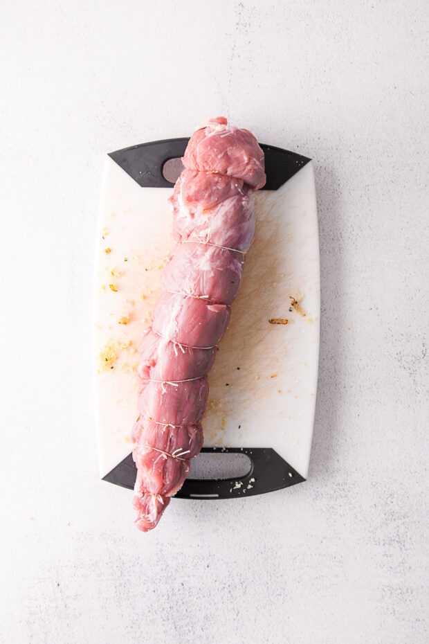 A rolled up Stuffed Pork Tenderloin.