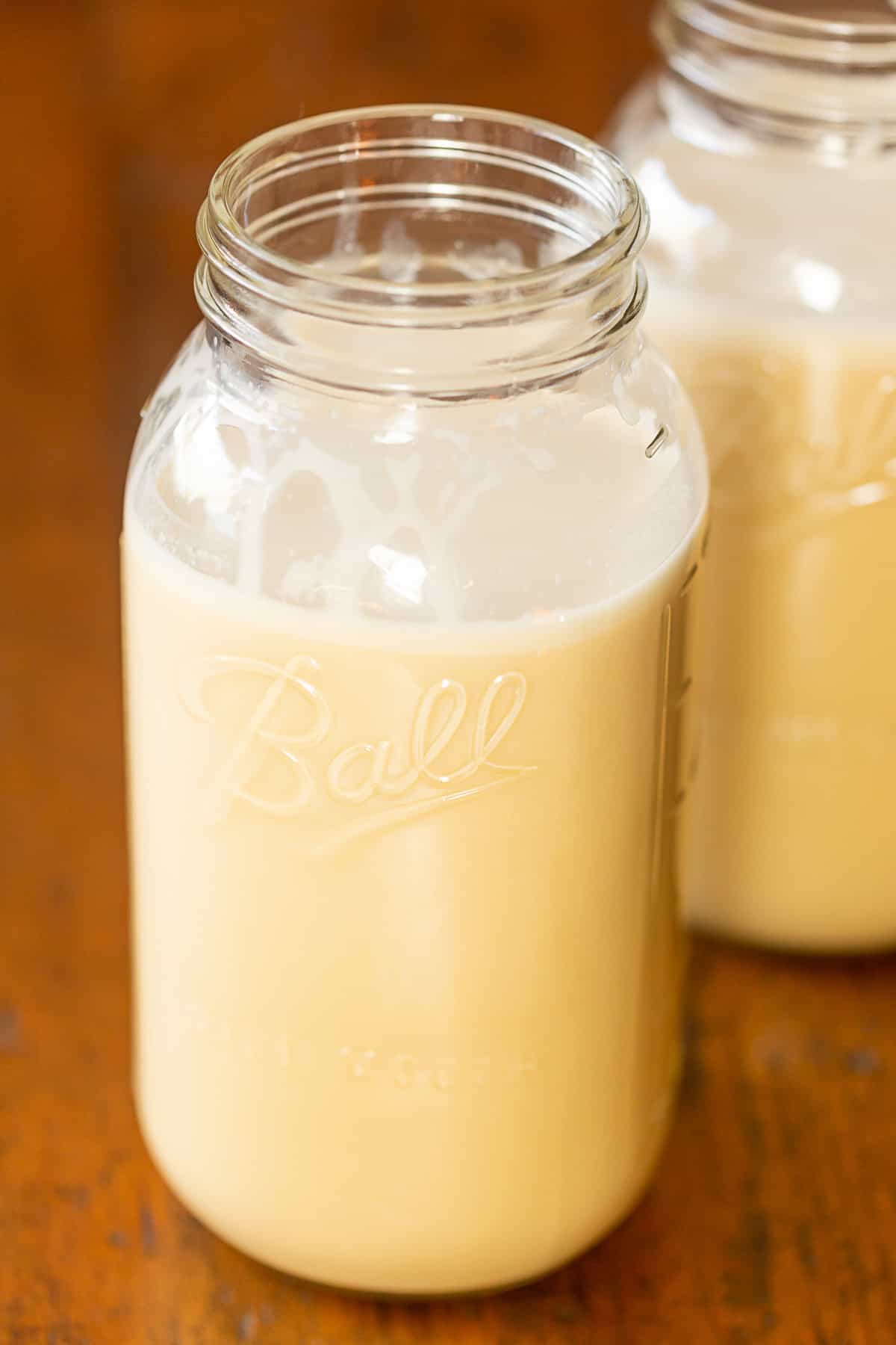 Aged Eggnog in 2 jars.