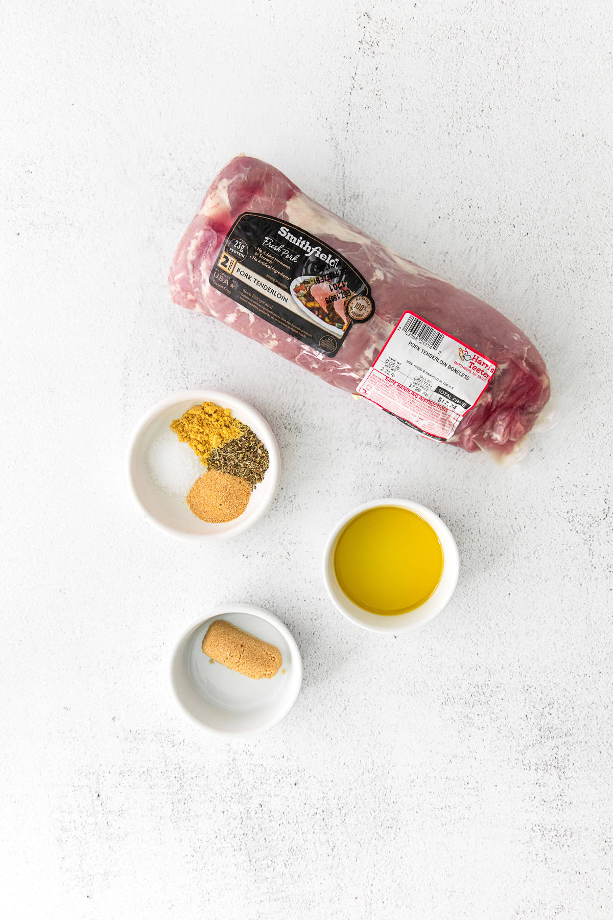 Ingredients for air fryer pork tenderloin on a table. 