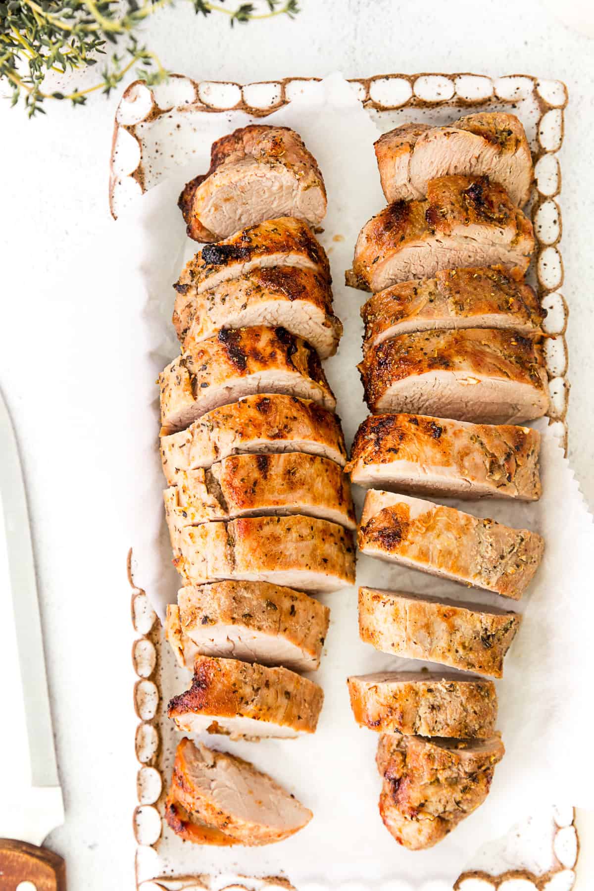 Air Fryer Pork Tenderloin cooked on a serving platter. 