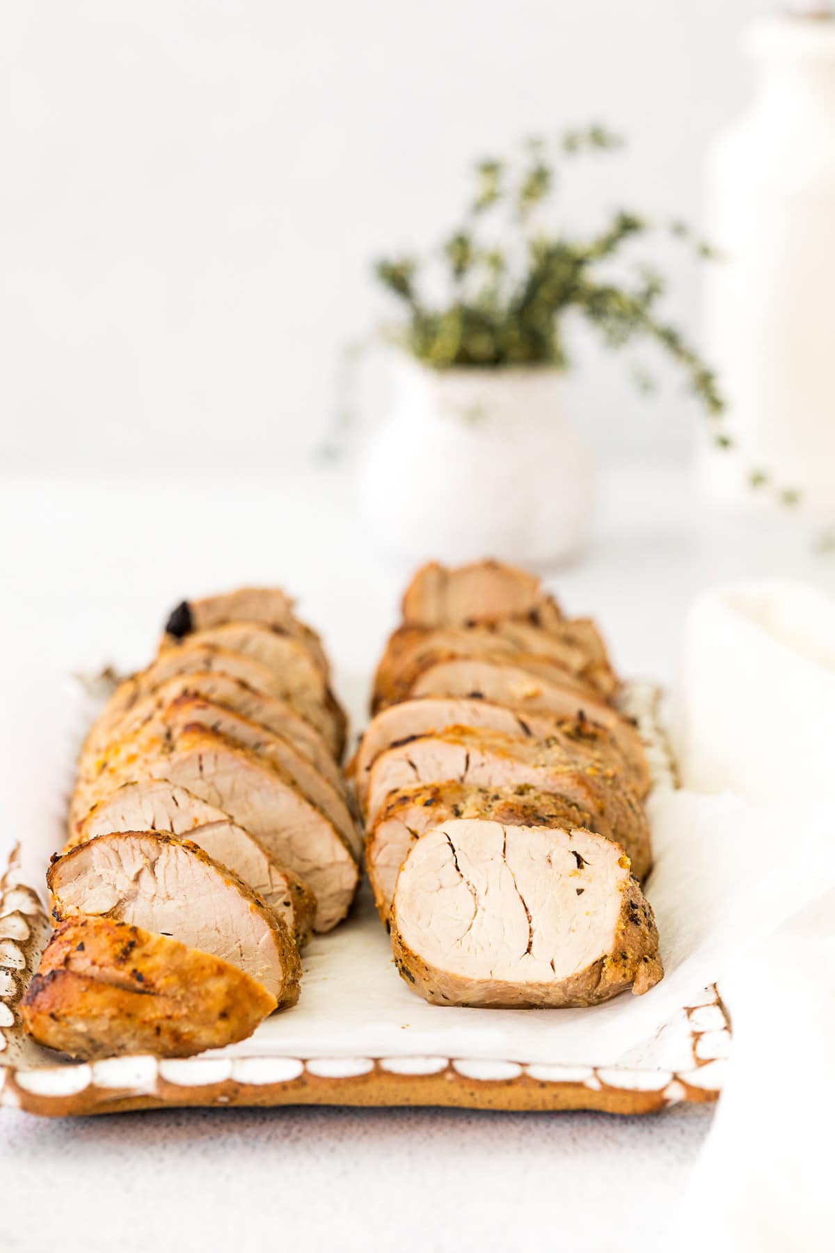 Air Fryer Pork Tenderloin sliced on a platter. 