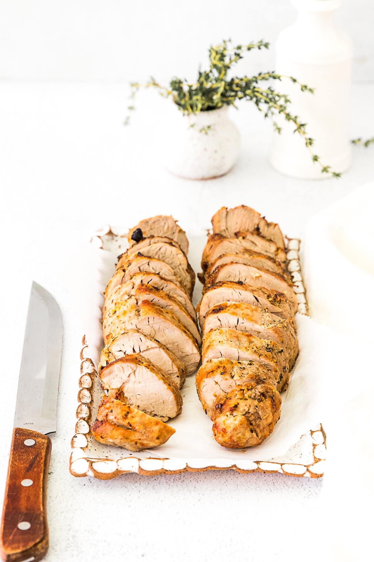 Air Fryer Pork Tenderloin on a white plate. 