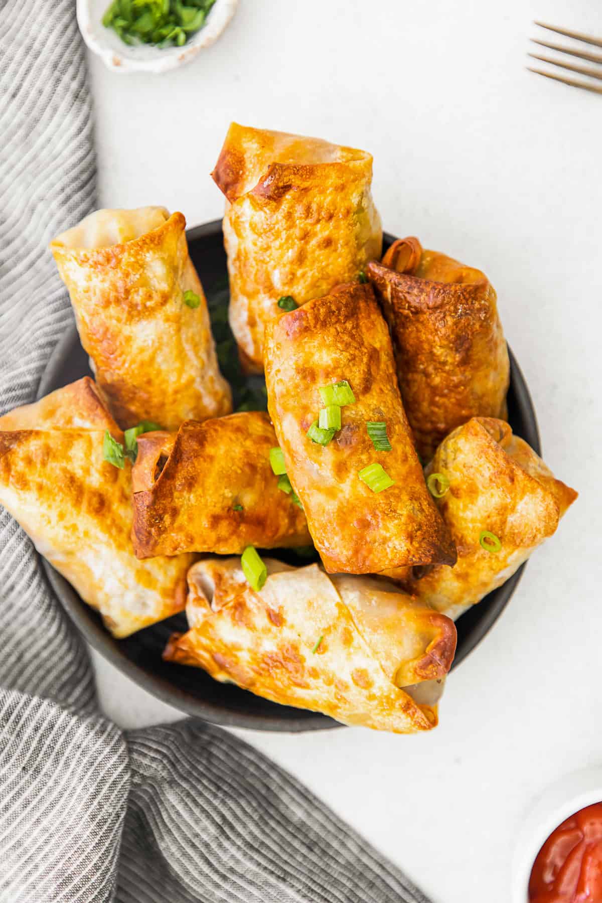 Air Fryer Cheeseburger Egg Rolls ina. bowl.