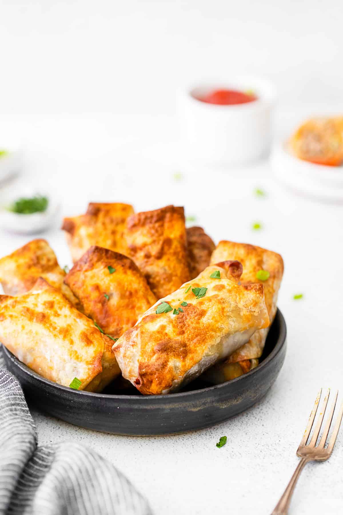 Air Fryer Cheeseburger Egg Rolls in a serving bowl.