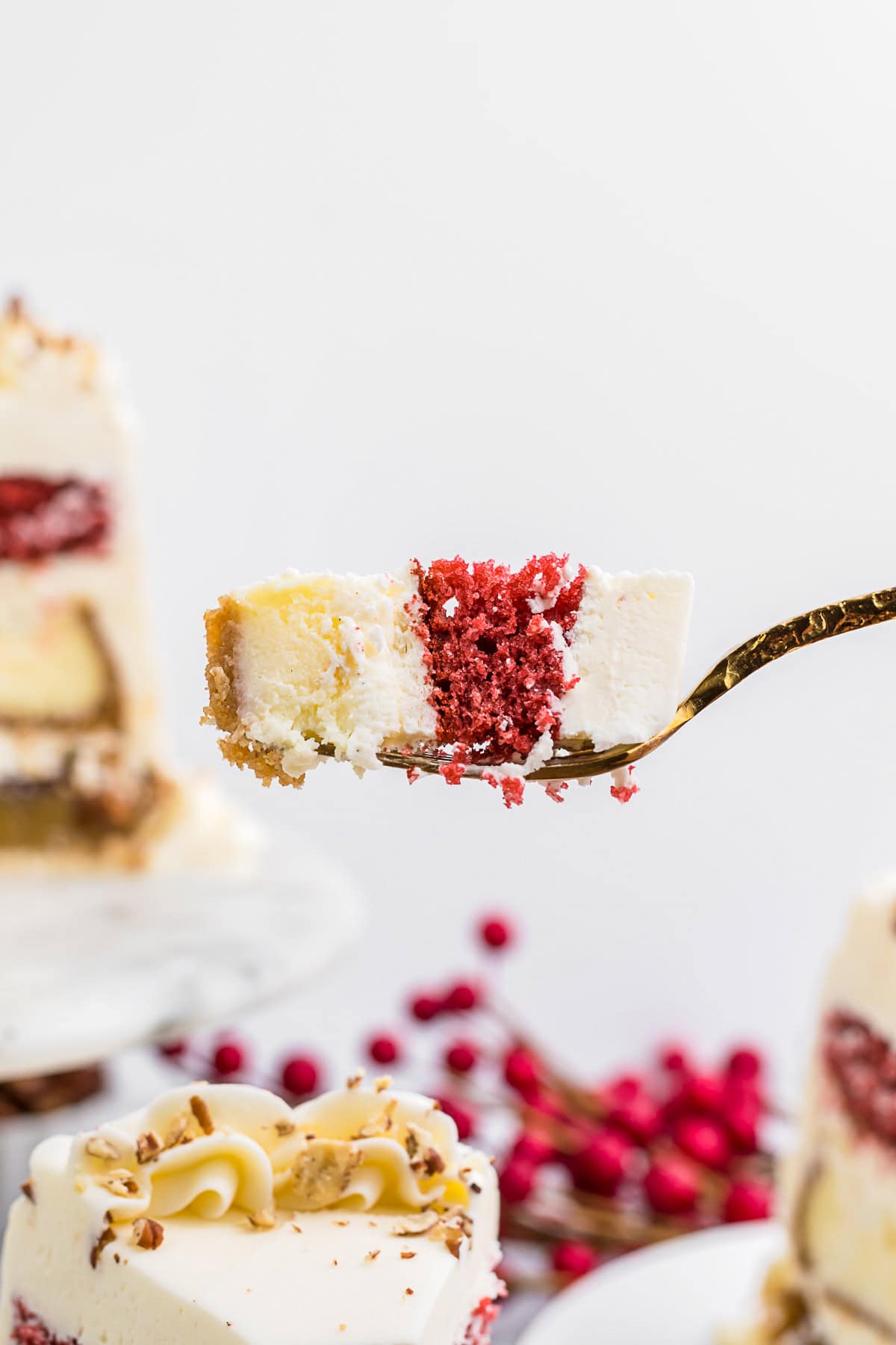 A fork holding a bite of piecaken. 