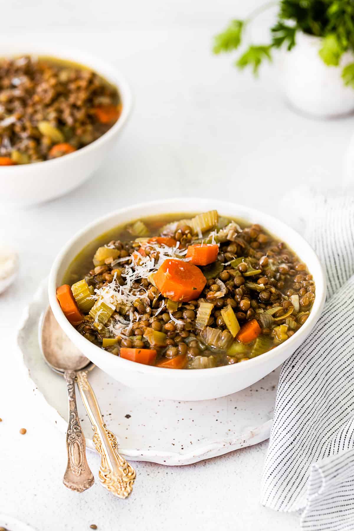 Healthy French Lentil Soup served in a white bowl. 