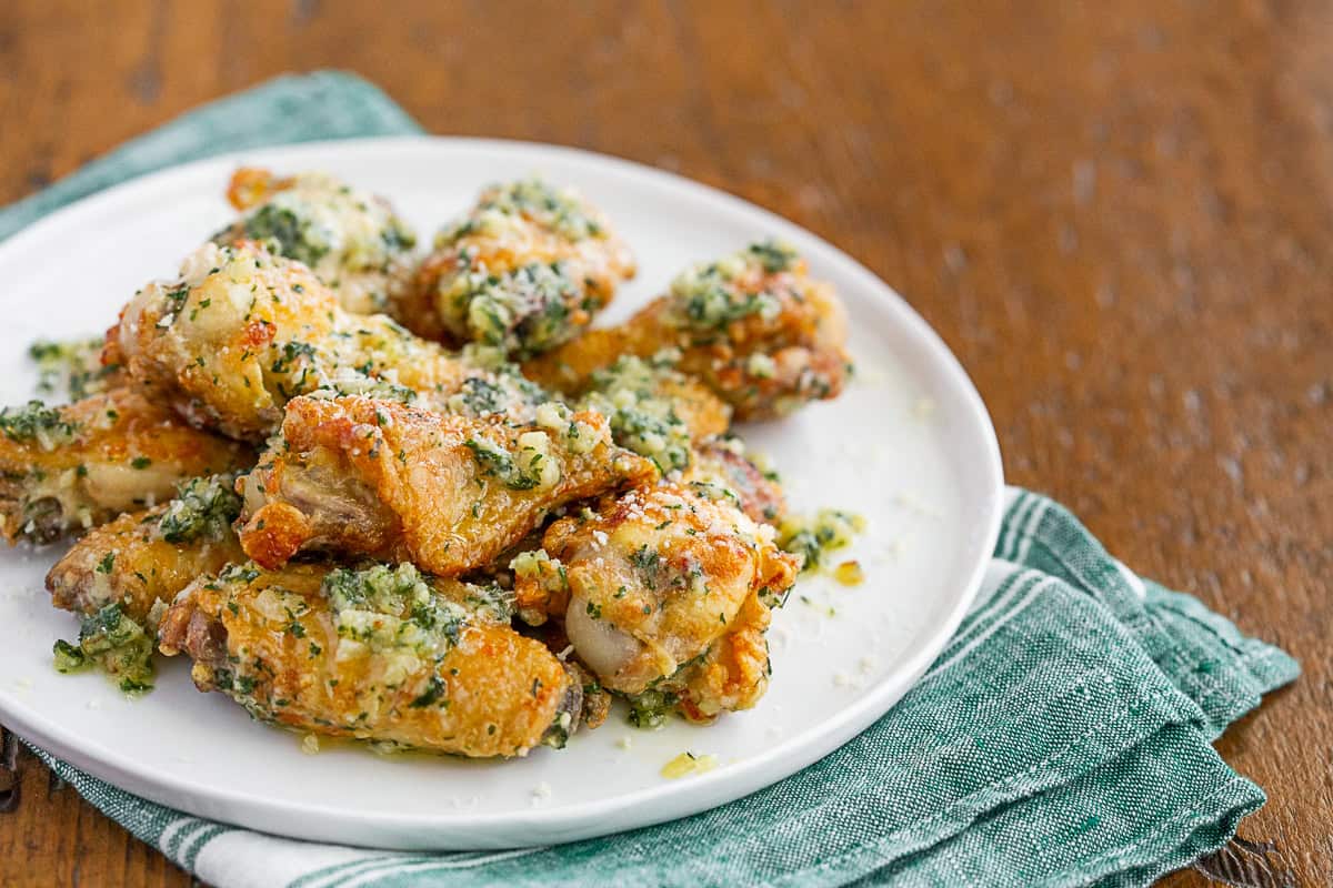 Garlic Parmesan Chicken Wings served with extra garlic sauce.