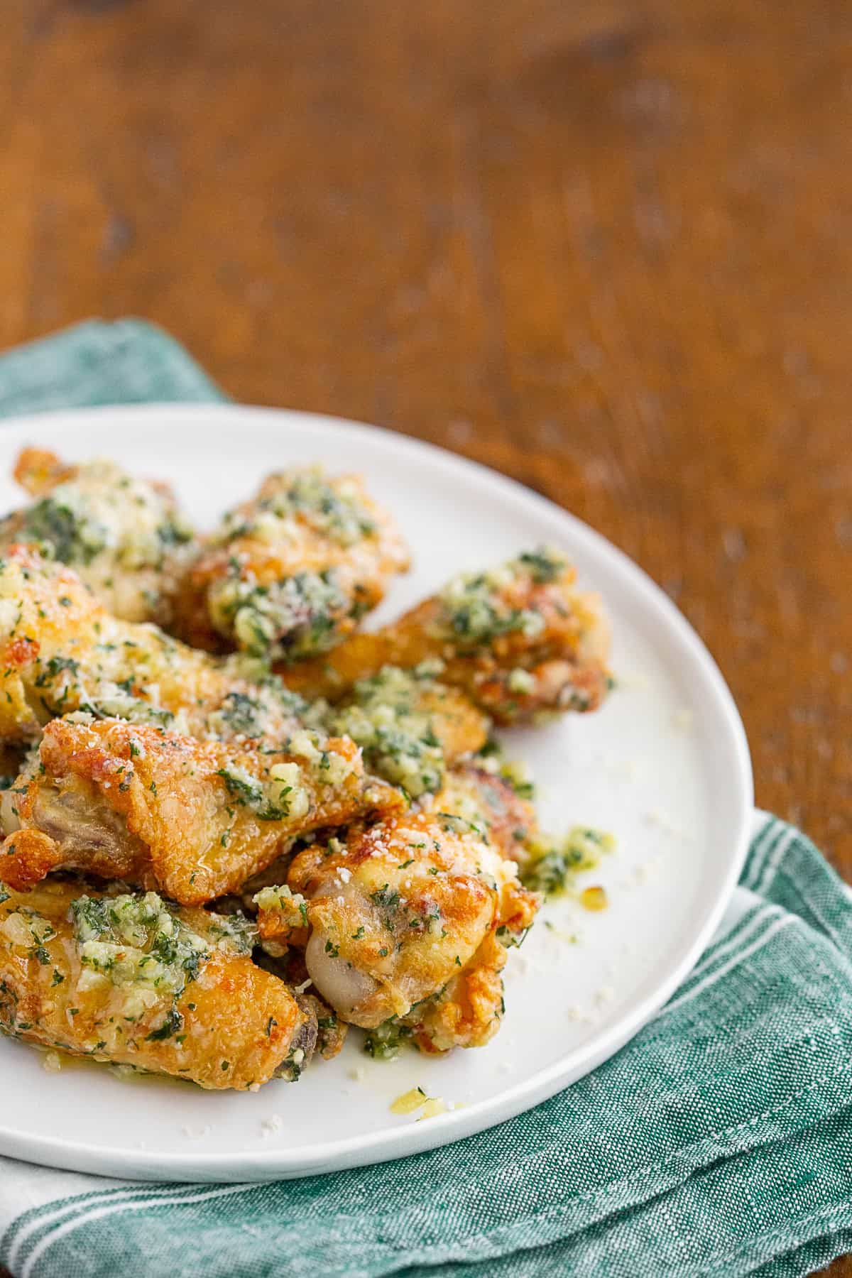 Garlic Parmesan Chicken Wings covered in sauce.