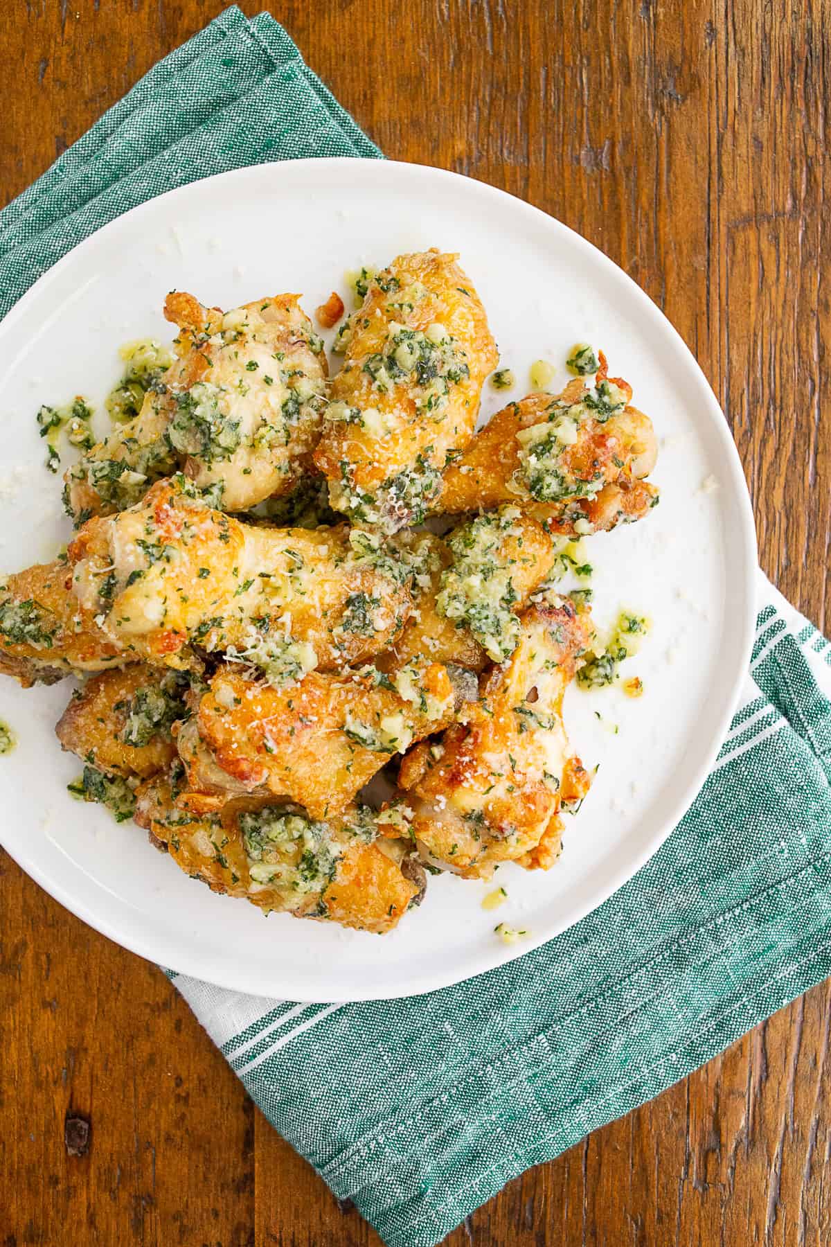 Garlic Parmesan Chicken Wings on a white plate.