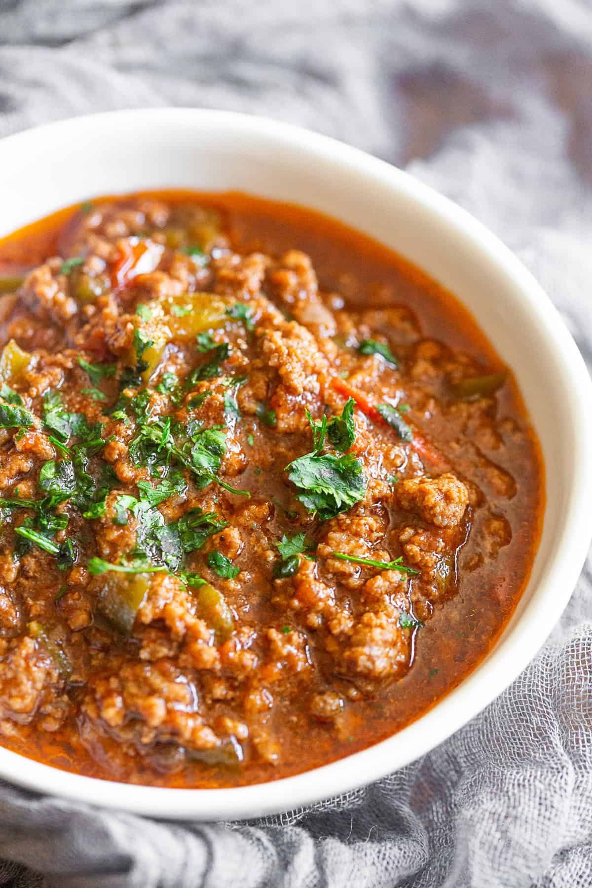 Ground Pork Chinese Chili served with cilantro. 
