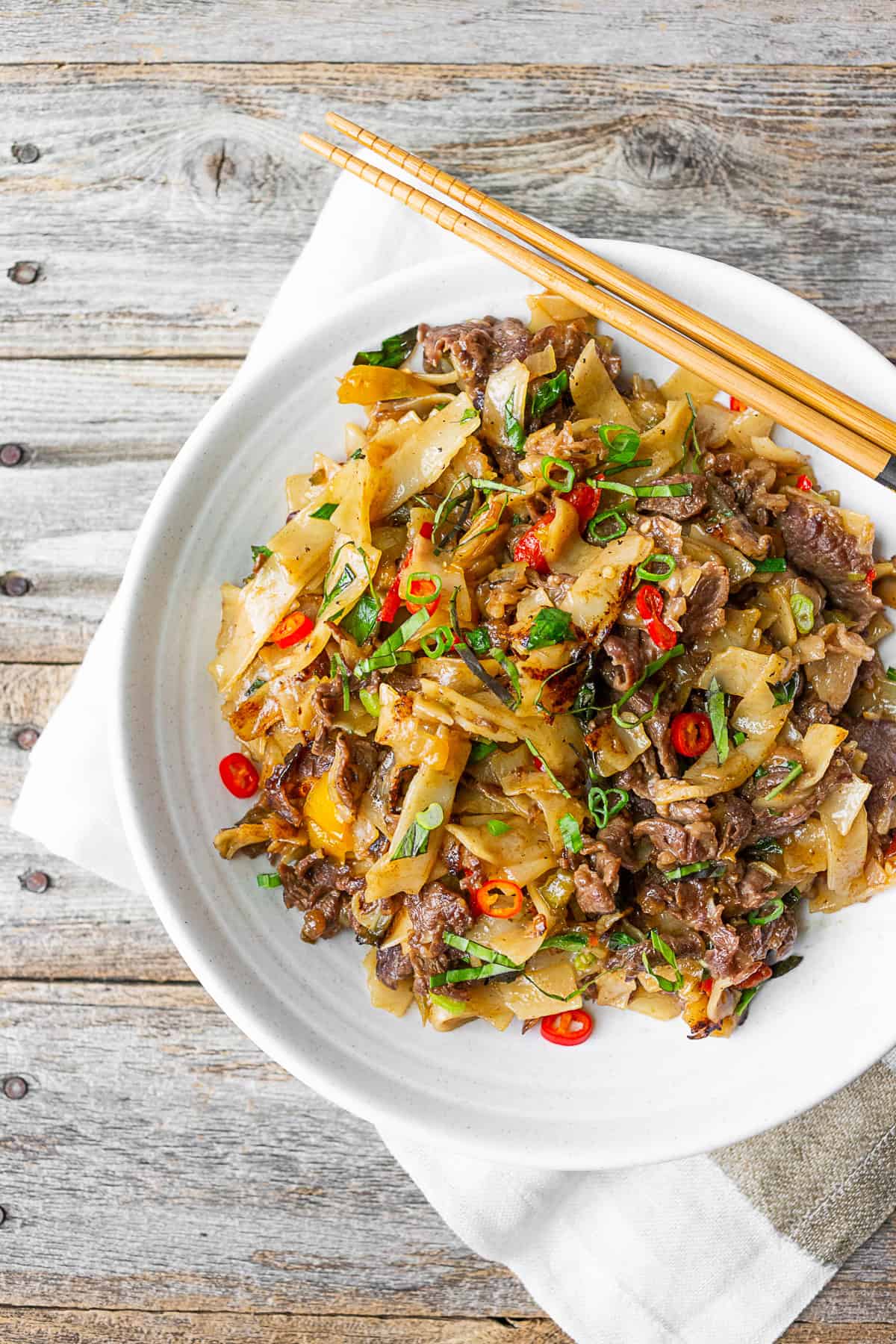 a large bowl full of Thai Beef Drunken Noodles