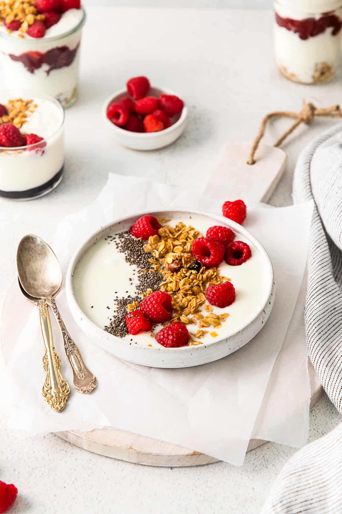 Instant Pot Yogurt topped with granola and fruit. 