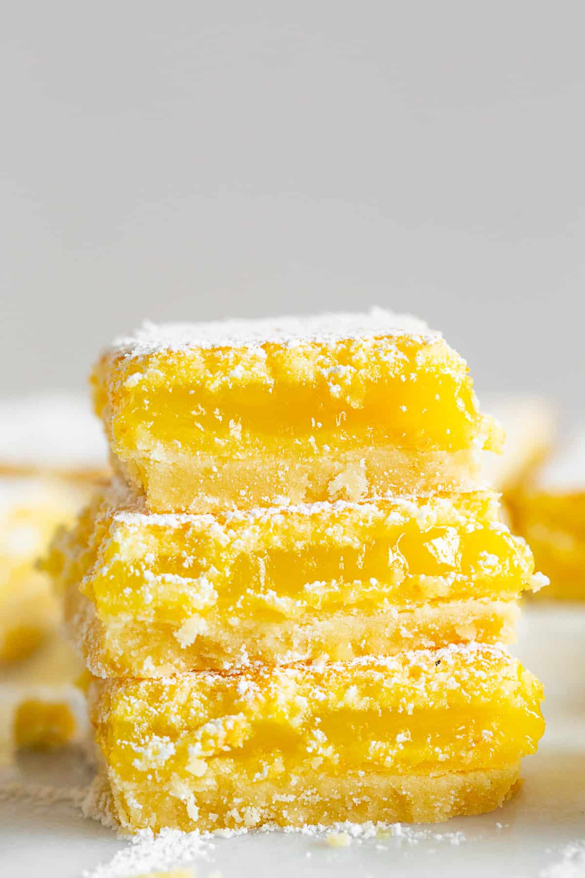 Homemade Lemon Bars sliced to show the inside. 