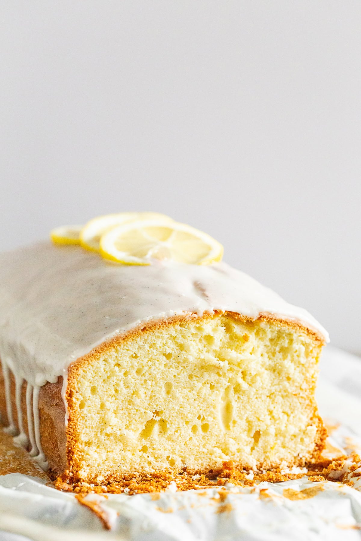 Vanilla Lemon Pound Cake on a wooden table. 