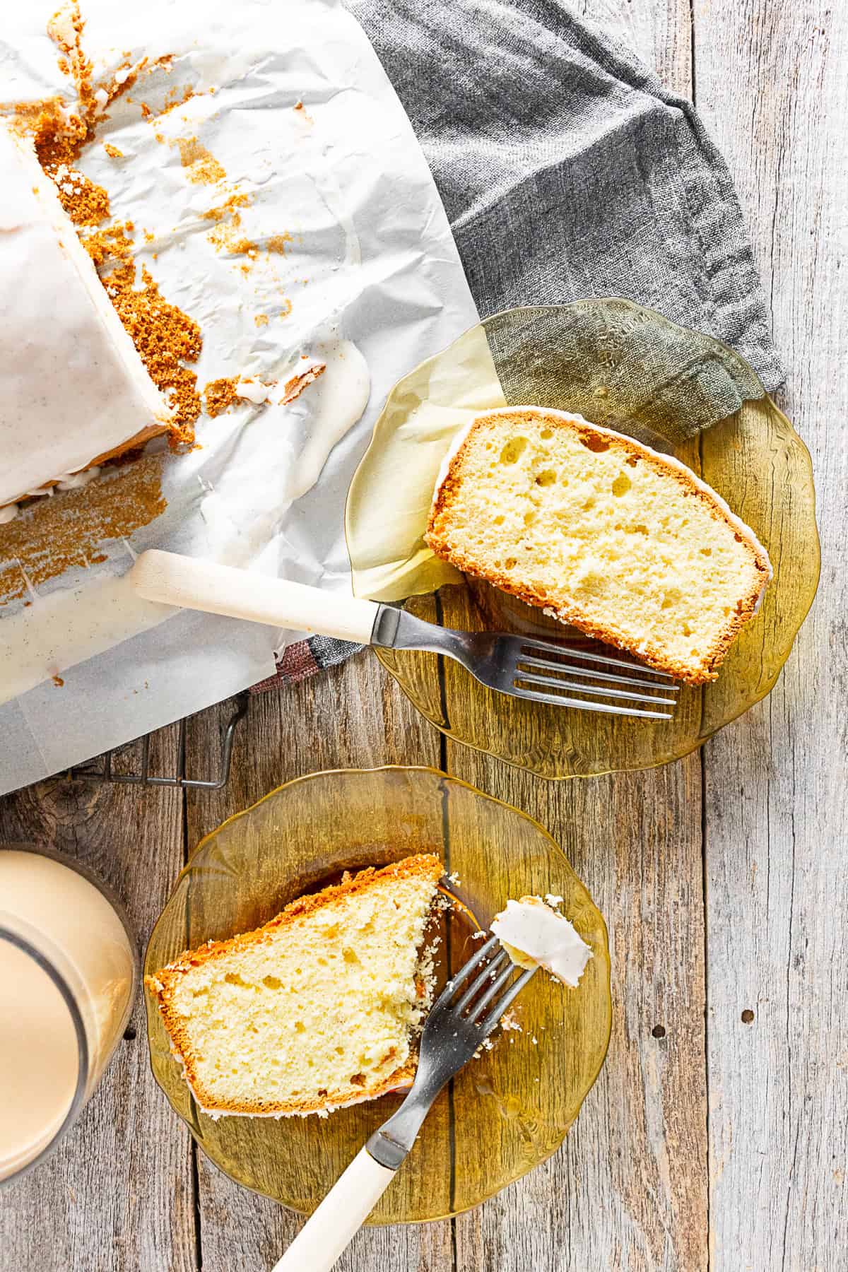 Vanilla Lemon Pound Cake sliced on 2 yellow plates. 