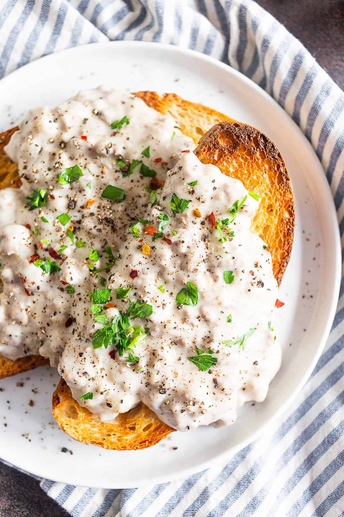 SOS Creamed Beef Recipe served with a sprinkle of parsley. 