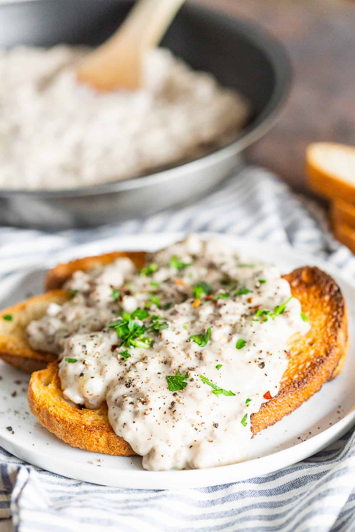 SOS Creamed Beef Recipe on a white plate. 