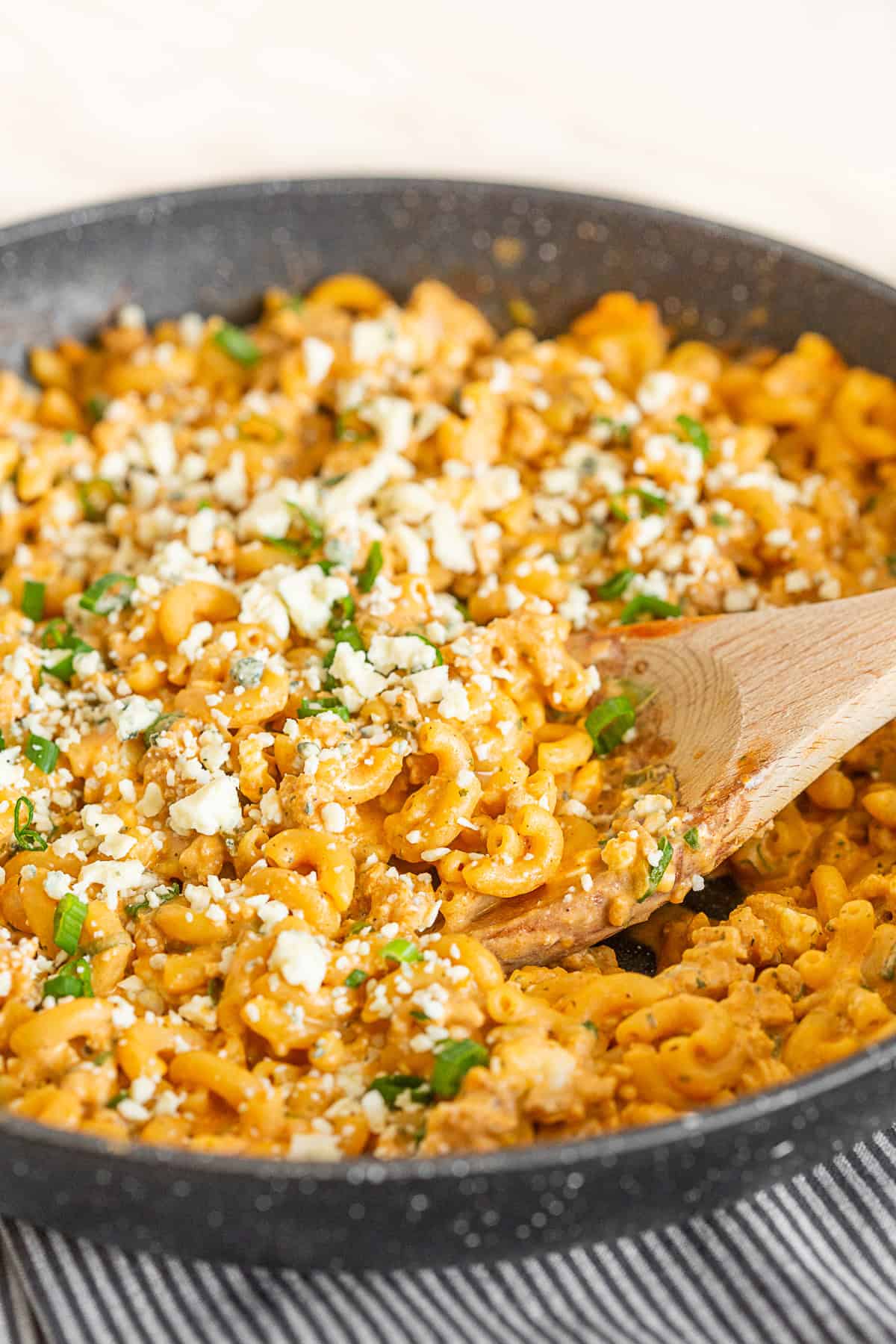 One Pot Buffalo Chicken Pasta in a black skillet. 