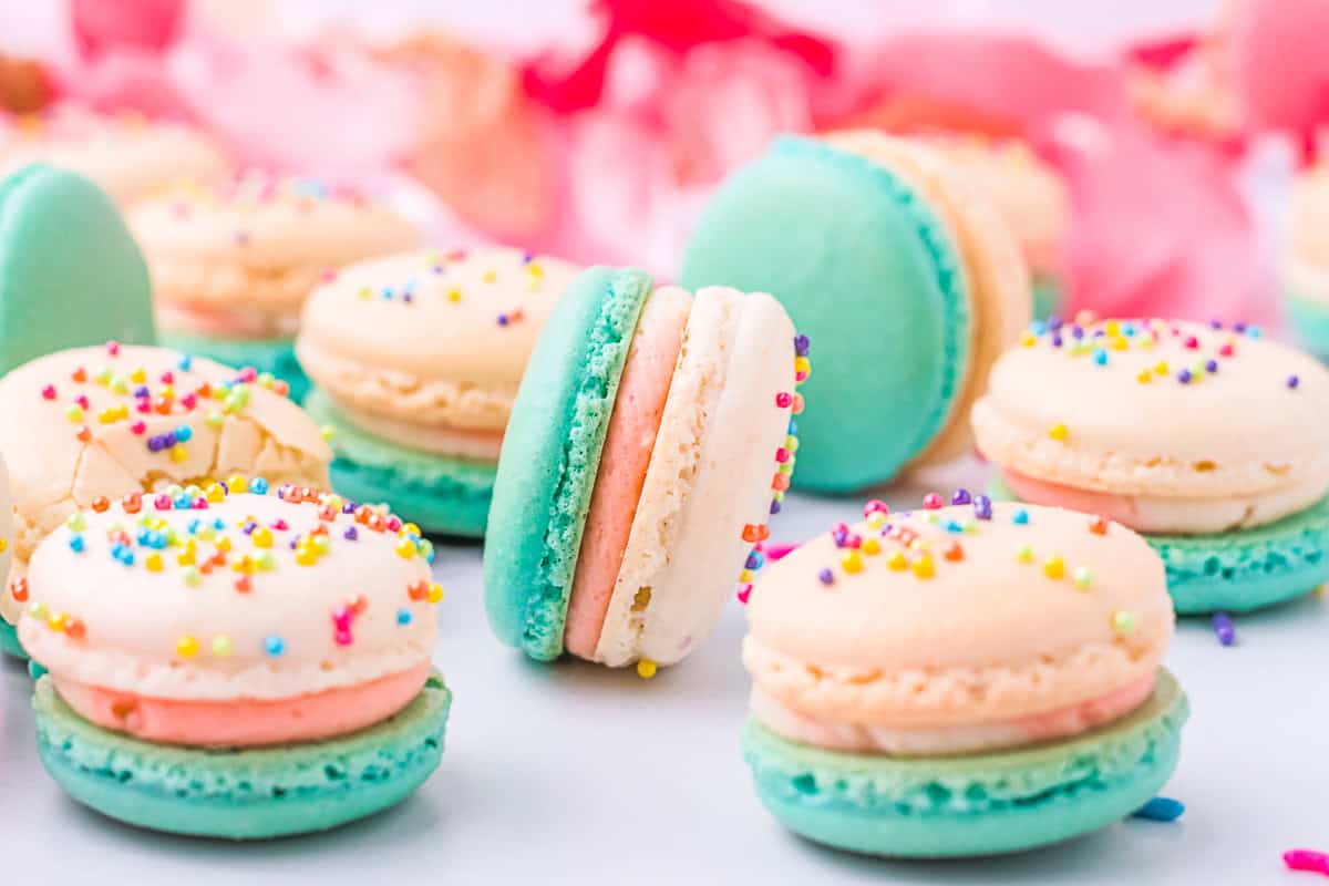 Birthday cake macarons on a marble decor board