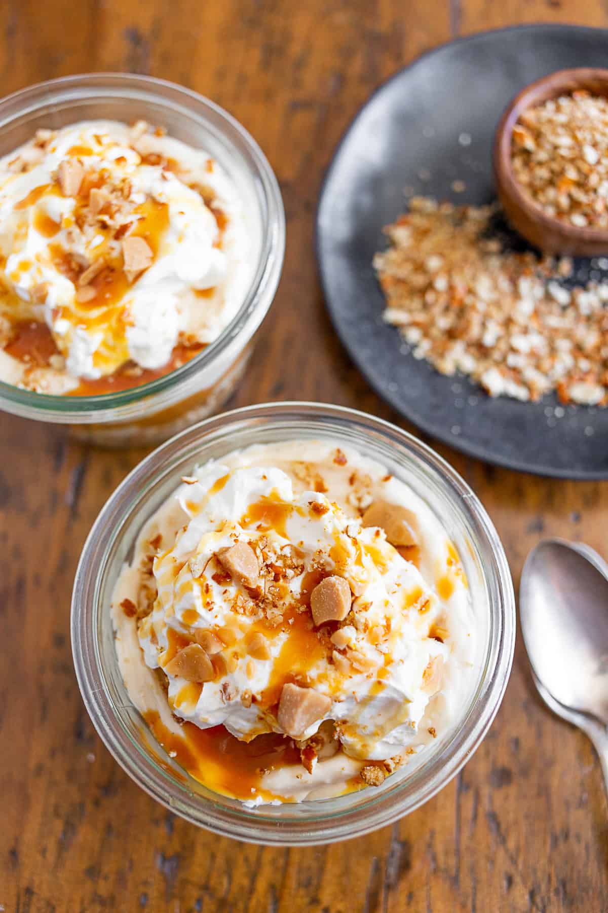 No Bake Caramel Cheesecake topped with crushed pretzels.