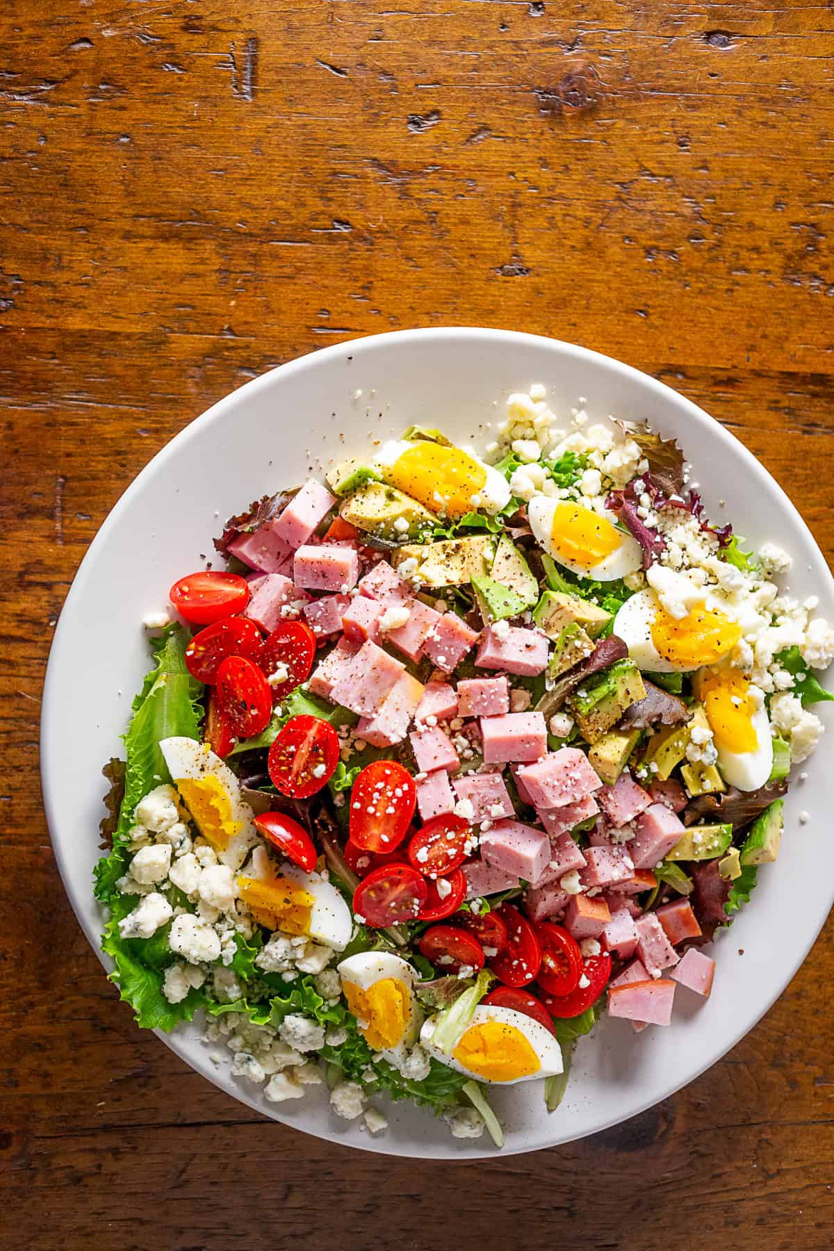 Ham Cobb Salad in a white large bowl.